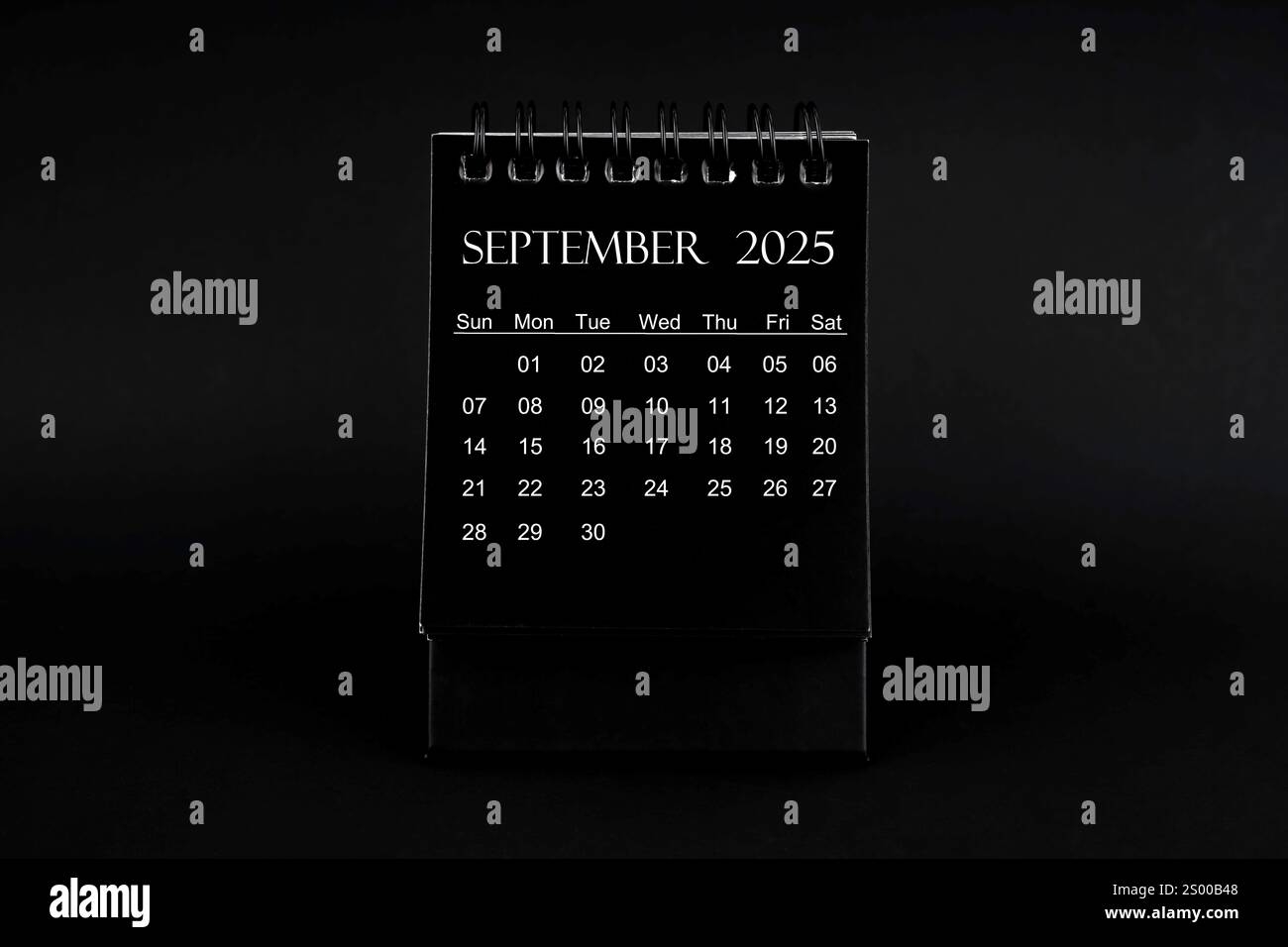 Black Calendar For September 2025 Desktop Calendar On A Green 